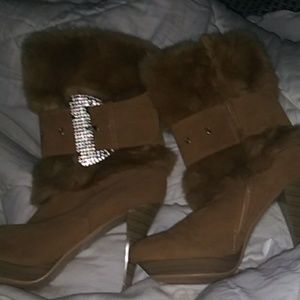Sexy fur high healed boots. Only worn once inside